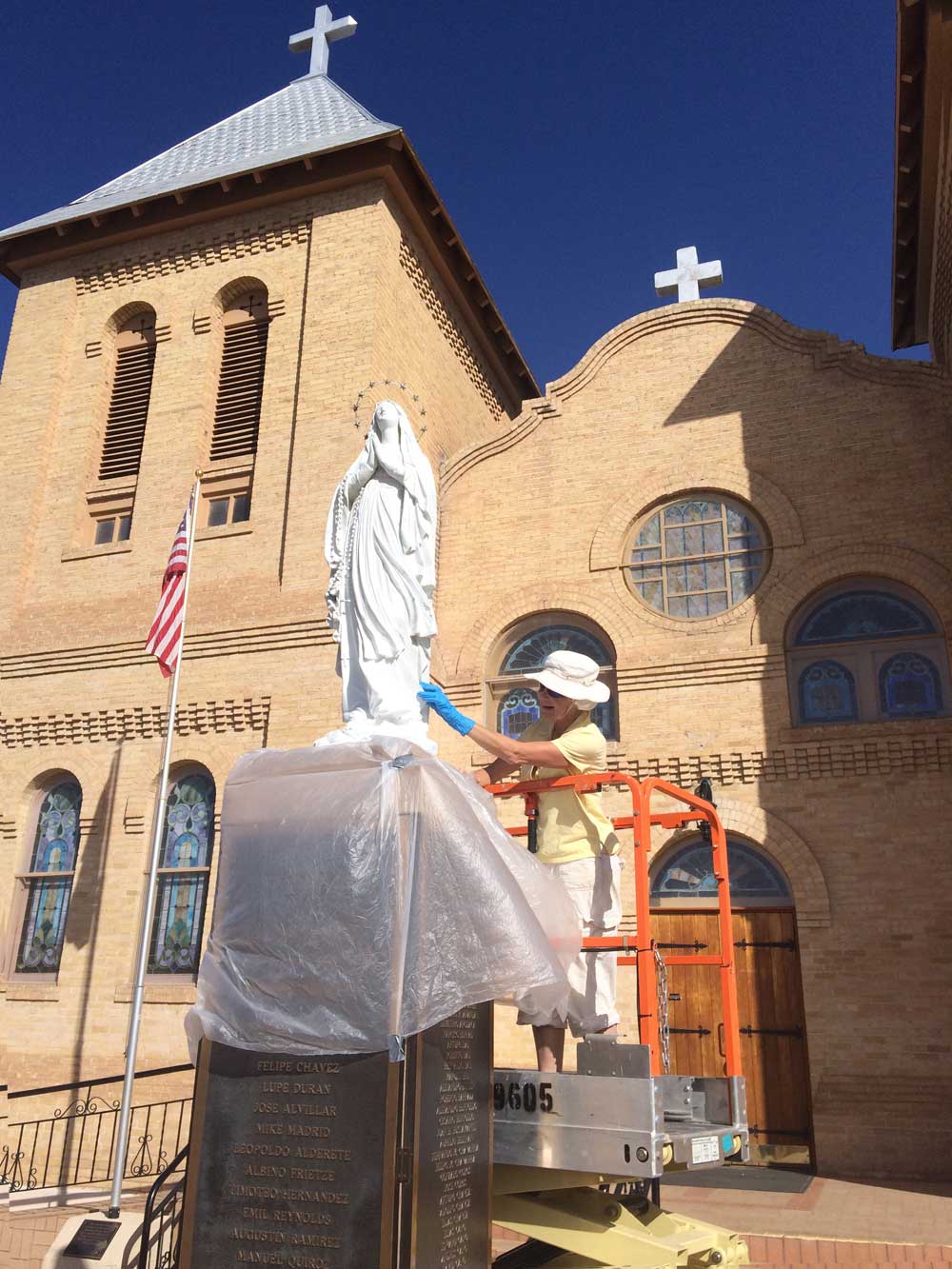 Virgin Mary statue restoration at Old Mesilla church in Mesilla New Mexico